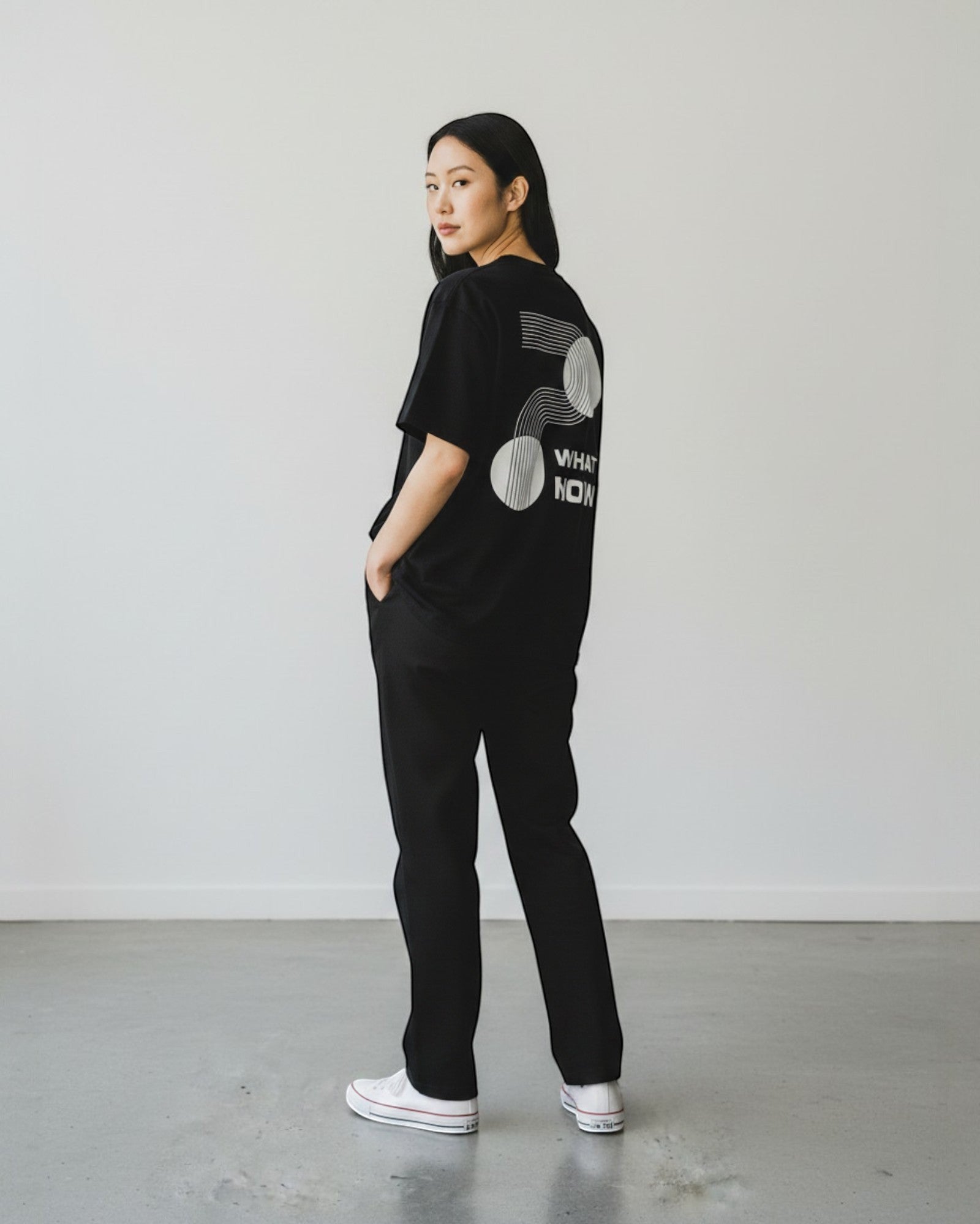 FALLR wear black 100% cotton oversized t-shirt with a white geometric graphic print and "What Now" text on the back.