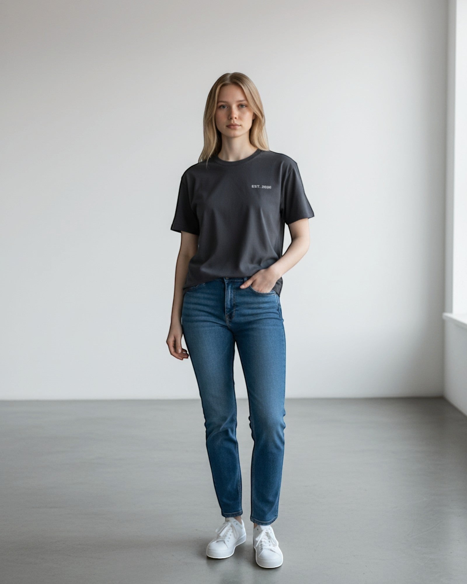 FALLR wear charcoal grey 100% cotton oversized t-shirt with minimalist "EST. 2020" graphic print on chest.