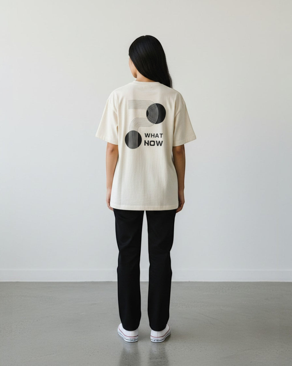 FALLR wear cream 100% cotton oversized t-shirt with black "What Now" graphic print on back.