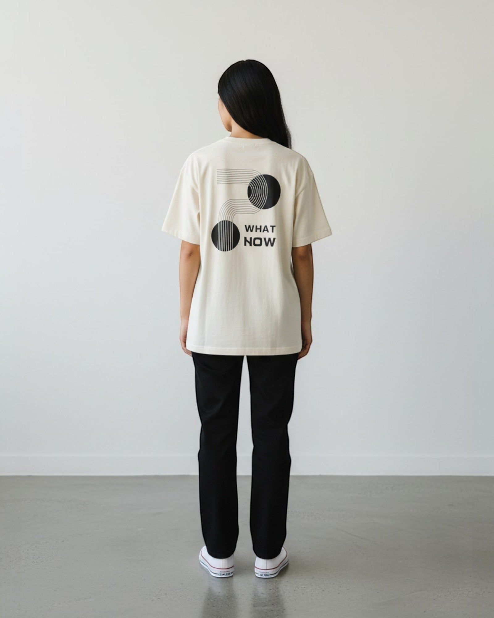 FALLR wear cream 100% cotton oversized t-shirt with black "What Now" graphic print on back.