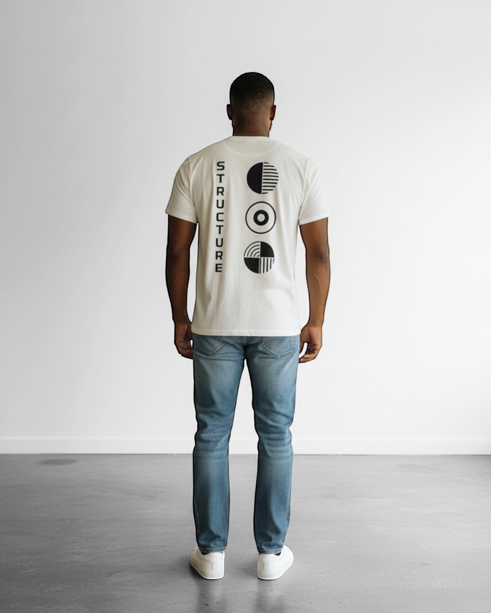 FALLR wear men's cream 100% cotton oversized t-shirt with black 'STRUCTURE' text and abstract graphic print on back.