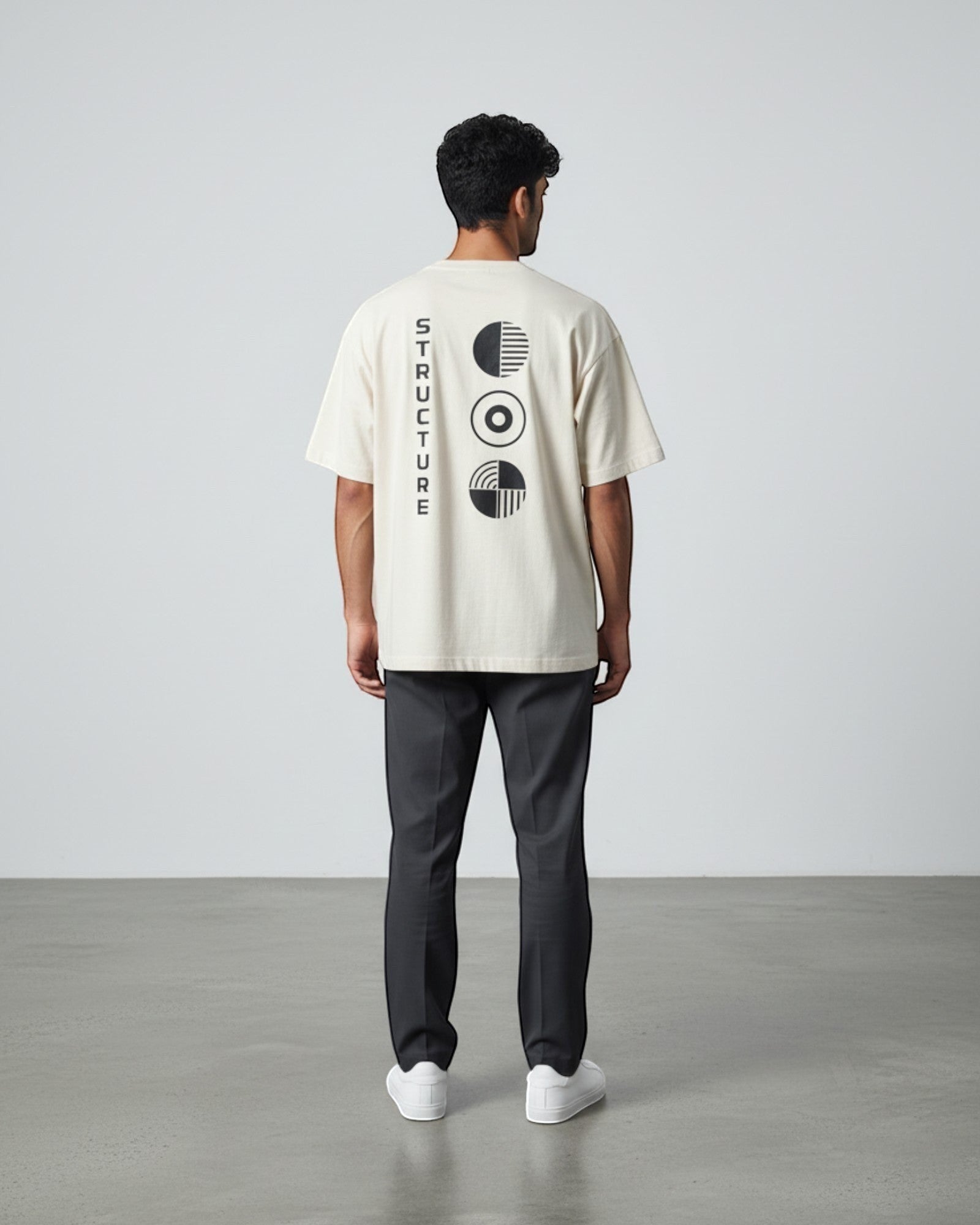 FALLR wear men's oversized cream 100% cotton t-shirt with black graphic print on back.