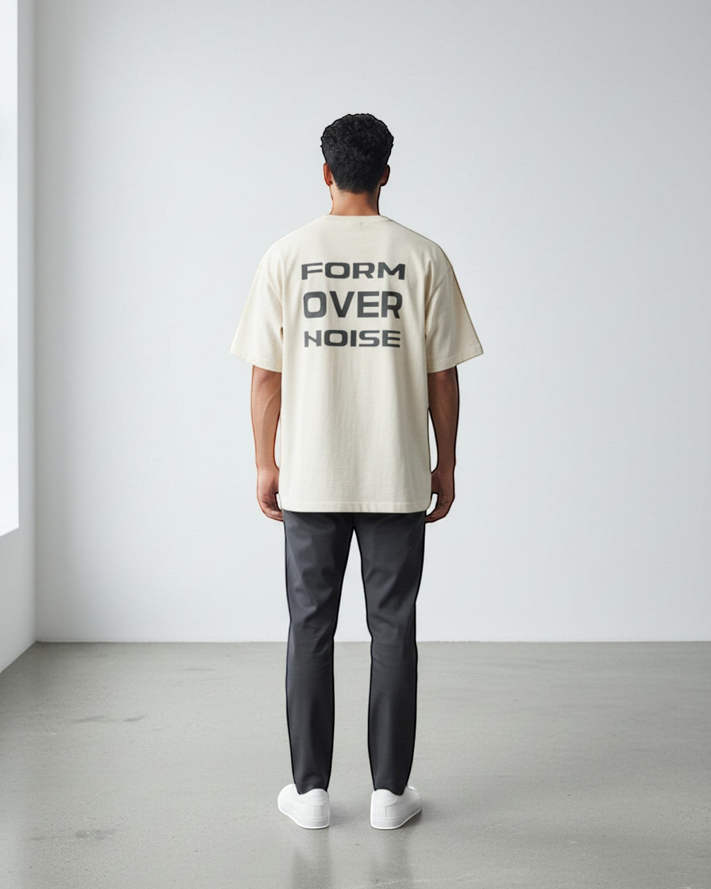FALLR wear cream 100% cotton oversized graphic t-shirt with black 'FORM OVER NOISE' print on back.