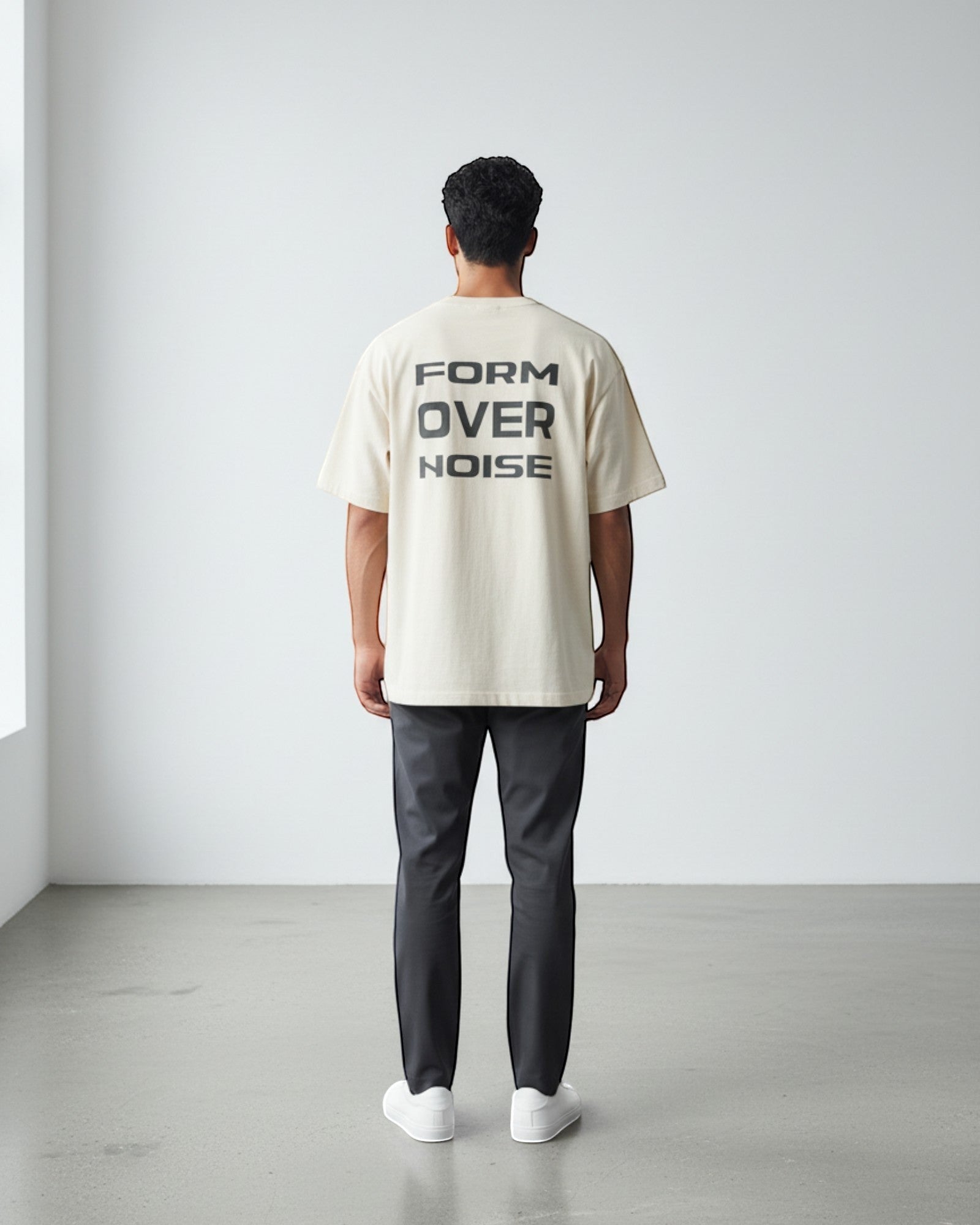 FALLR wear cream 100% cotton oversized graphic t-shirt with black 'FORM OVER NOISE' print on back.