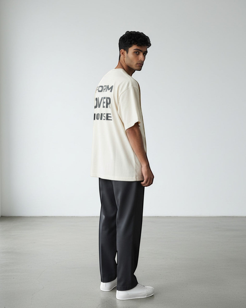 FALLR wear cream 100% cotton oversized graphic t-shirt with black 'FORM OVER NOISE' print on back.