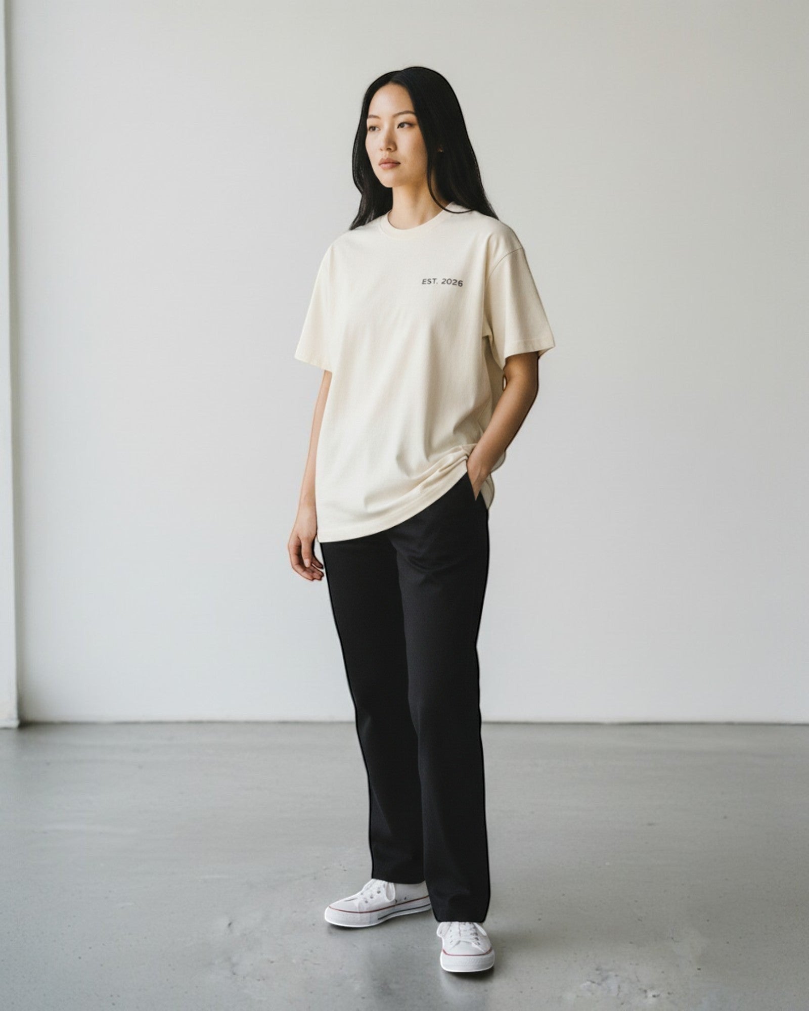 FALLR wear cream 100% cotton oversized tee with minimalist black 'EST. 2026' graphic on chest.