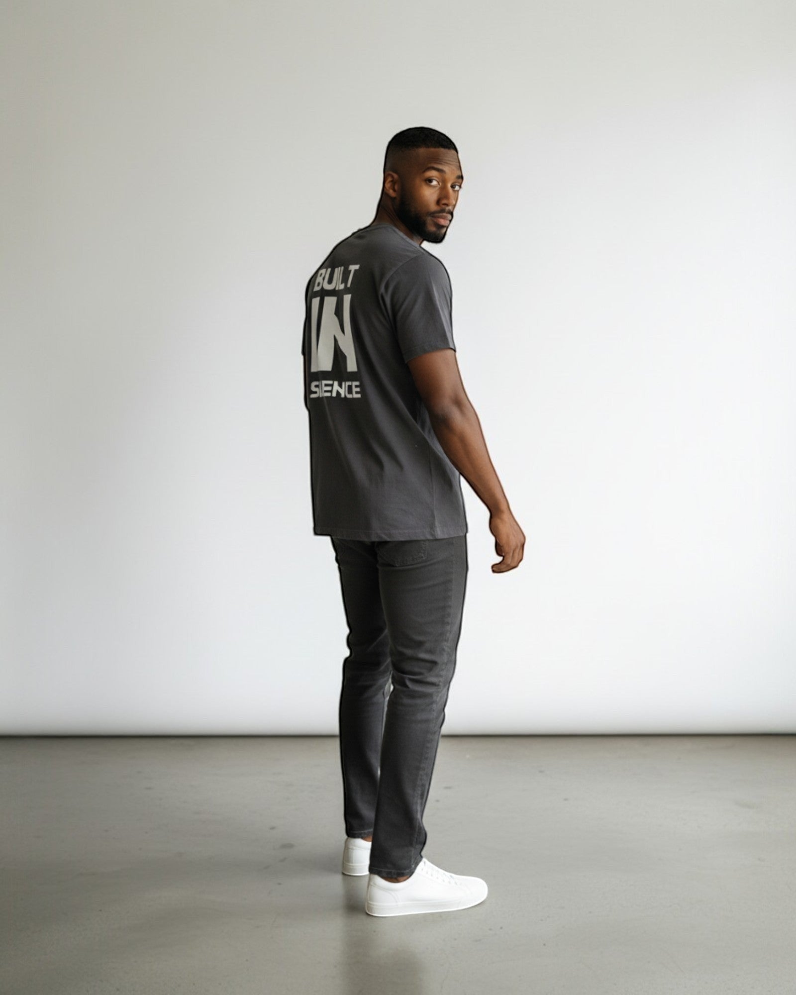 FALLR wear men's dark grey 100% cotton oversized t-shirt with white "BUILT IN SILENCE" graphic on back.
