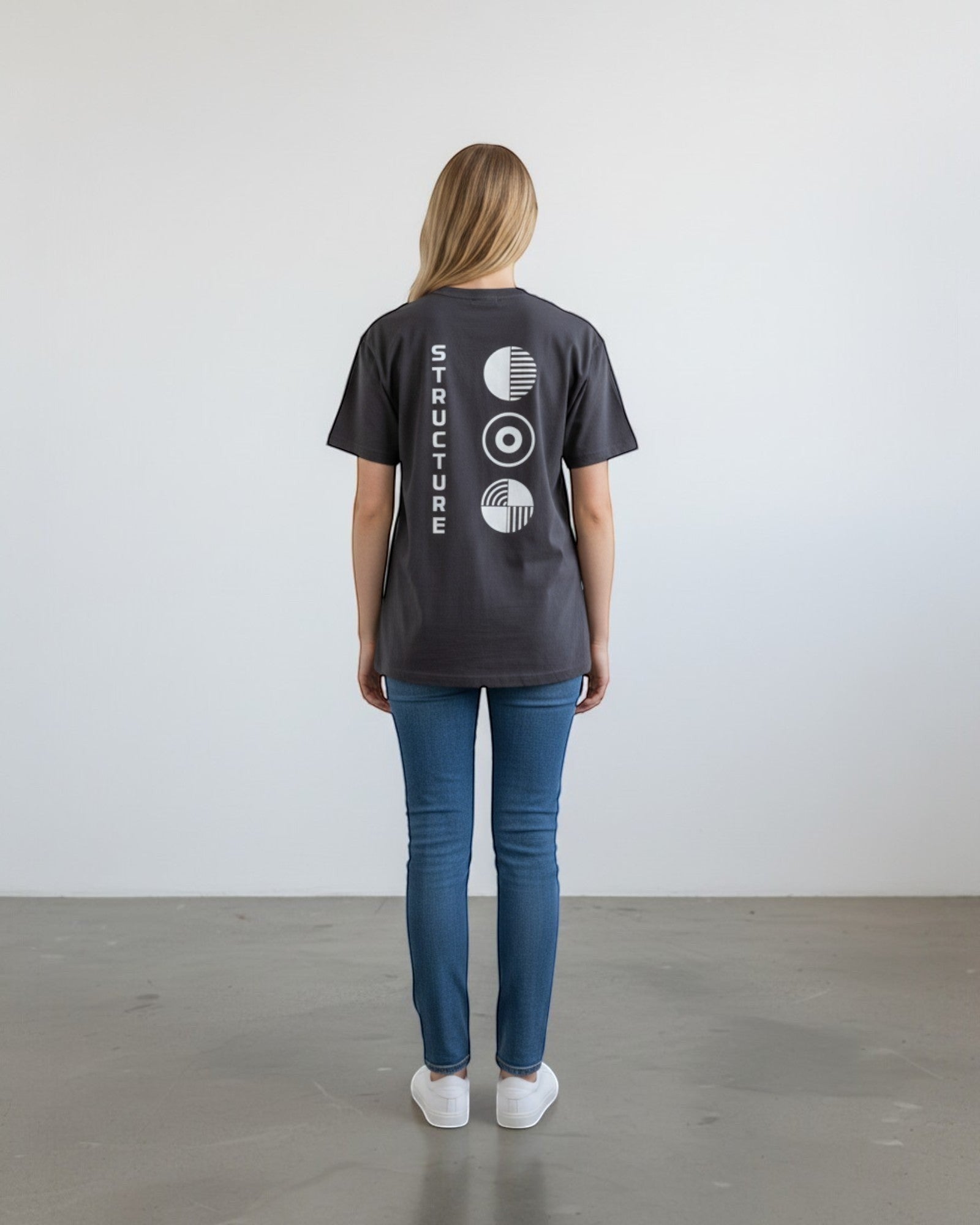 FALLR wear dark grey 100% cotton unisex oversized t-shirt with white vertical text and abstract circular graphic print on back.