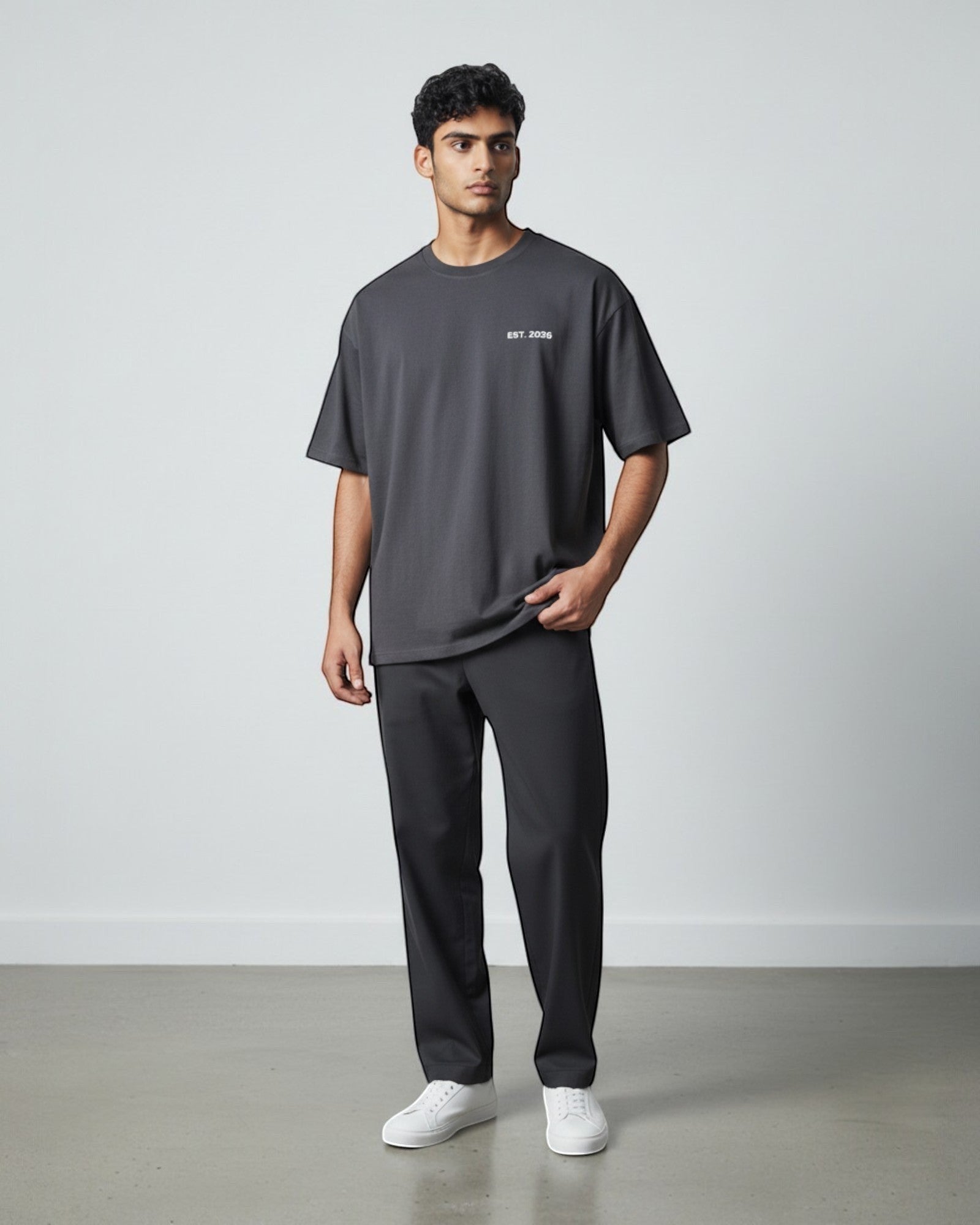 FALLR wear men's dark grey 100% cotton oversized t-shirt with small white 'EST. 2036' graphic on chest.