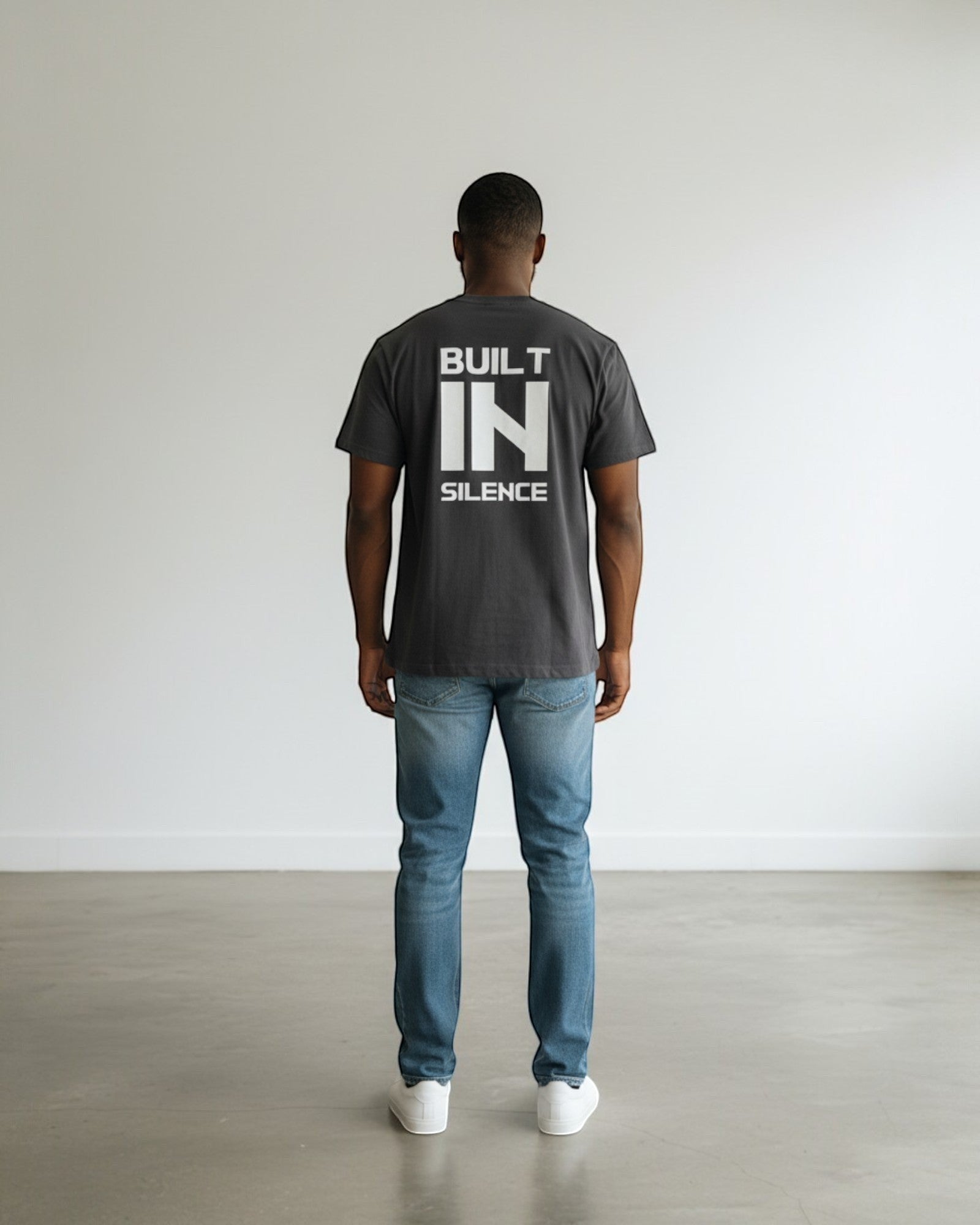 FALLR wear men's dark grey 100% cotton oversized t-shirt with white "BUILT IN SILENCE" graphic on back.