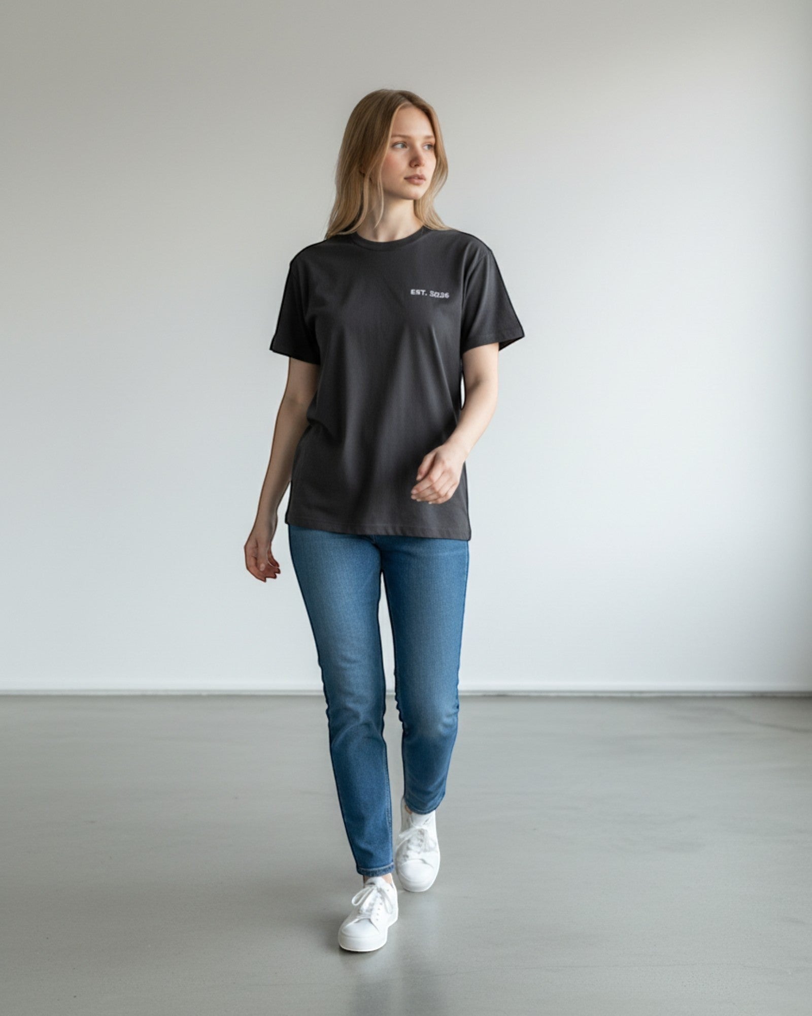 FALLR wear dark grey 100% cotton oversized t-shirt with minimalist 'EST. 2026' graphic on chest.