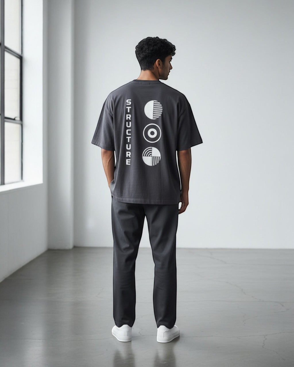 FALLR wear men's dark grey 100% cotton oversized t-shirt with white graphic print on back and vertical text.