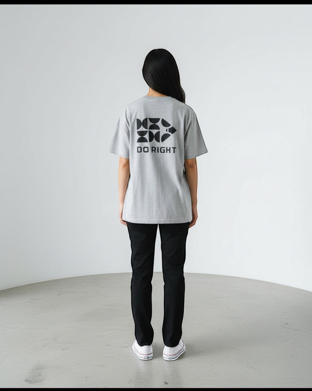 FALLR wear grey 100% cotton oversized t-shirt with black 'DO RIGHT' graphic print on back, worn by a woman.