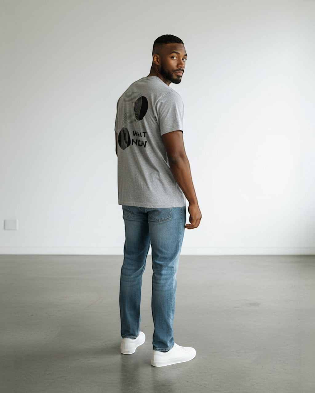 FALLR wear grey 100% cotton oversized t-shirt with black geometric graphic print and text "What Now" on back.
