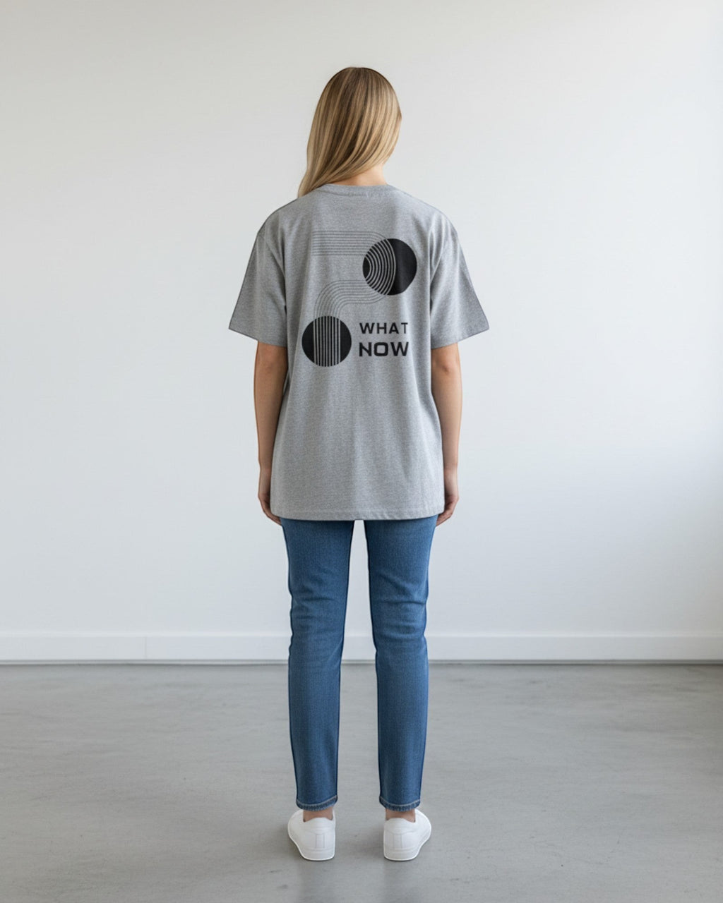 FALLR wear grey 100% cotton oversized t-shirt with black 'What Now' graphic print on back.