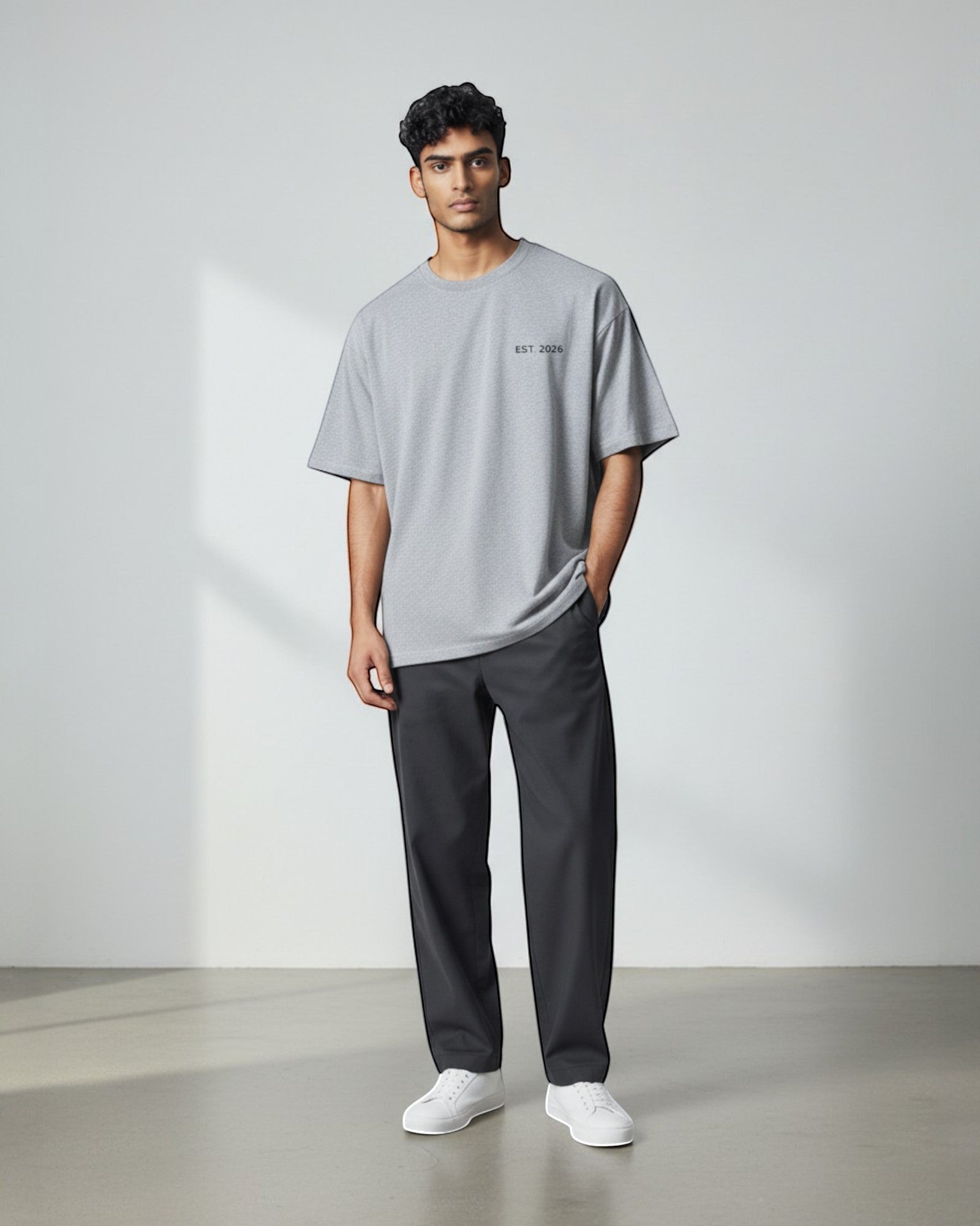 FALLR wear grey 100% cotton oversized t-shirt with minimalist 'EST 2026' graphic print on chest.