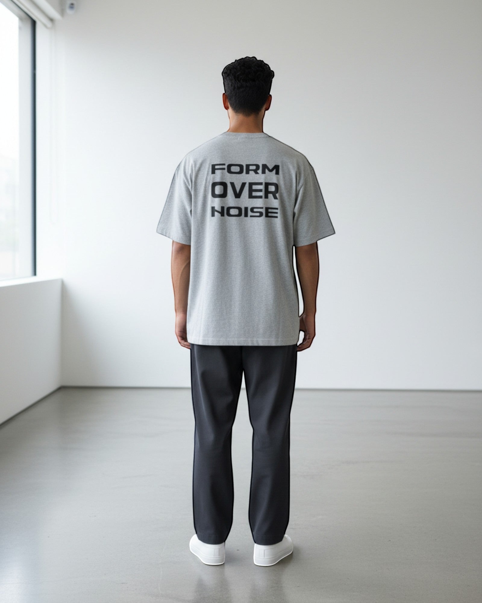 FALLR wear grey 100% cotton oversized t-shirt with black 'FORM OVER NOISE' graphic print on back.
