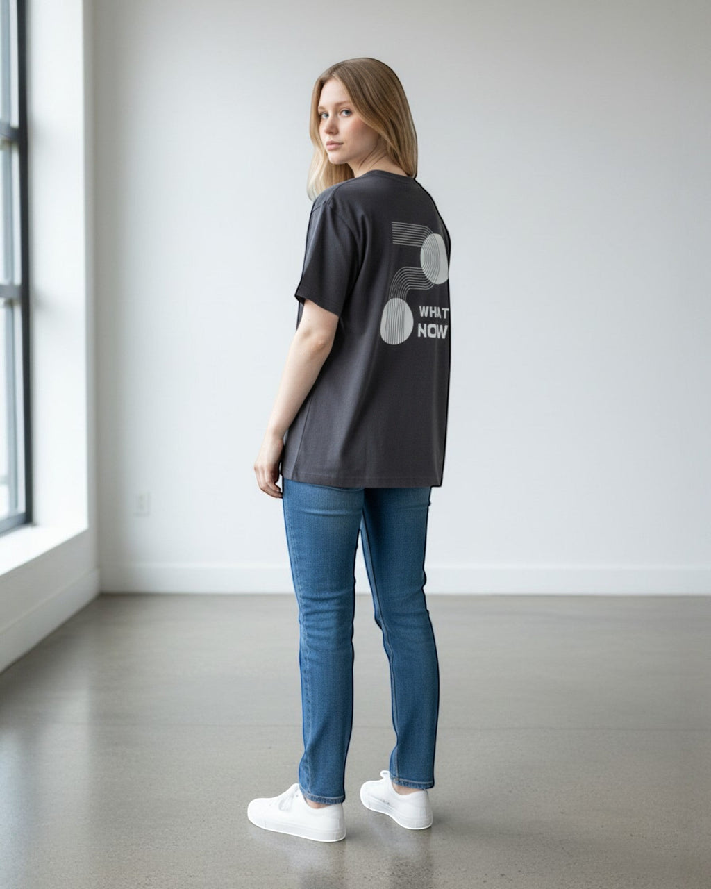 FALLR wear dark grey 100% cotton t-shirt with minimalist geometric "What Now" graphic print on back.