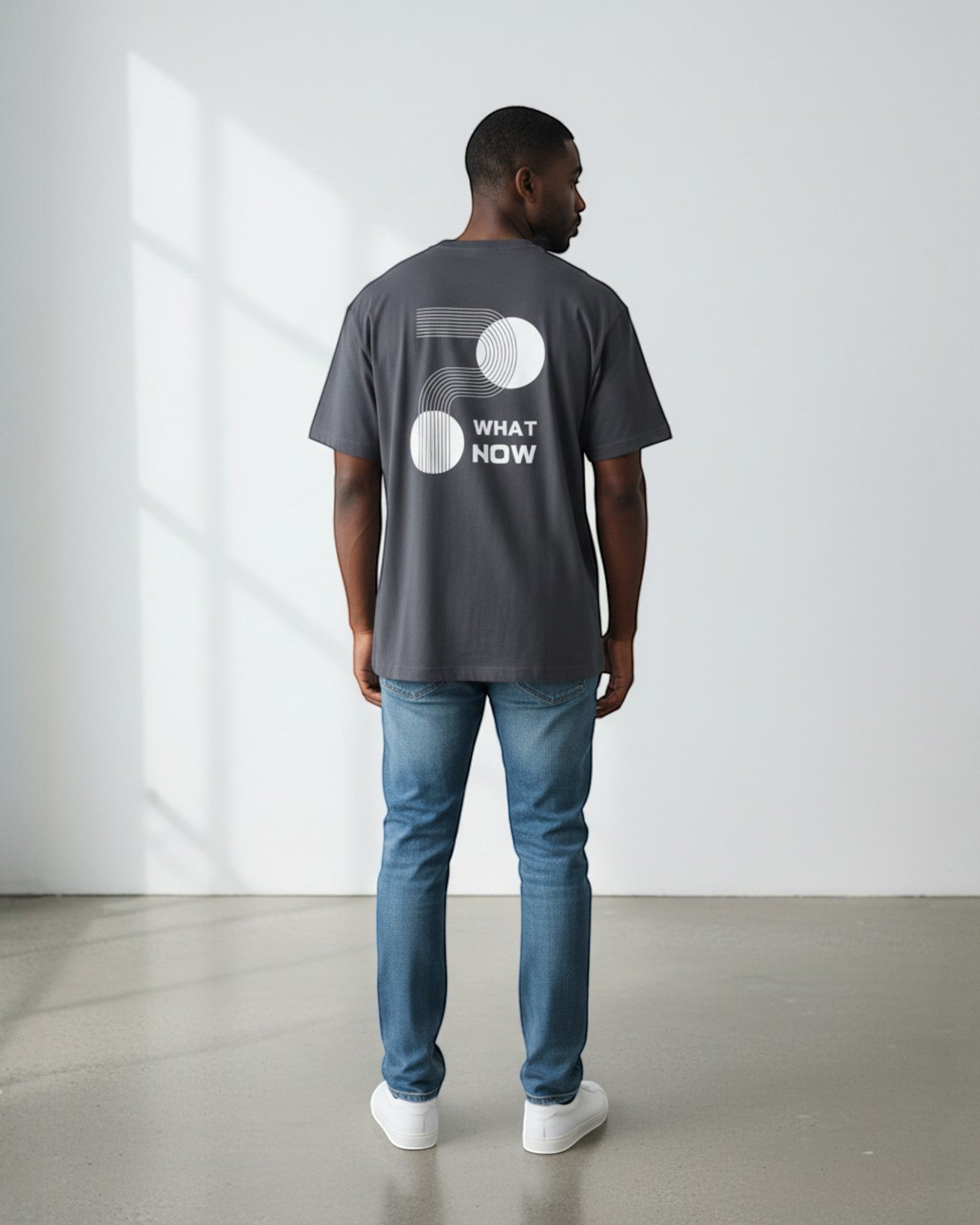 FALLR wear dark grey 100% cotton oversized t-shirt with abstract geometric print and "What Now" text.
