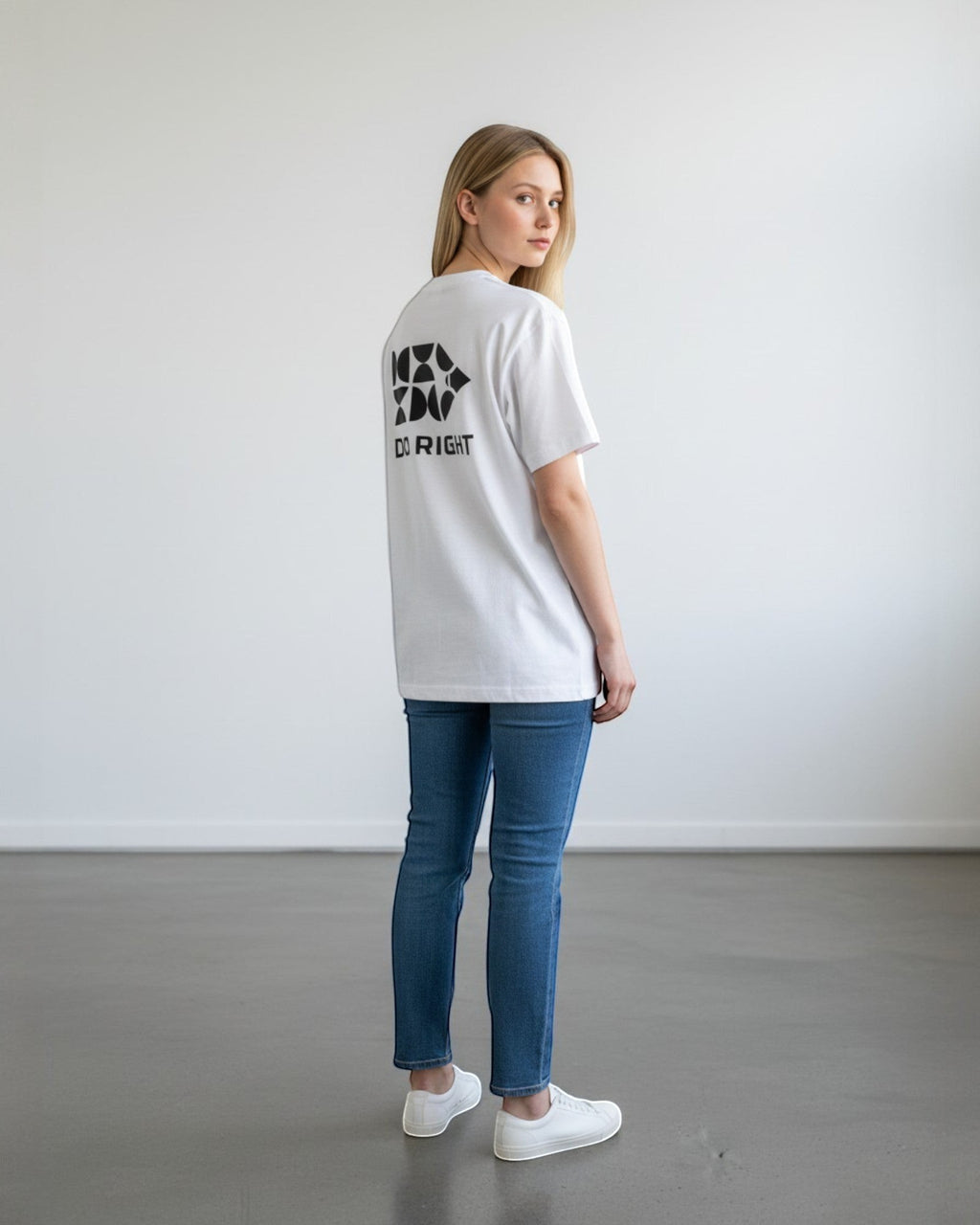 FALLR wear white 100% cotton oversized tee with black 'DO RIGHT' graphic print on back, worn by a woman.